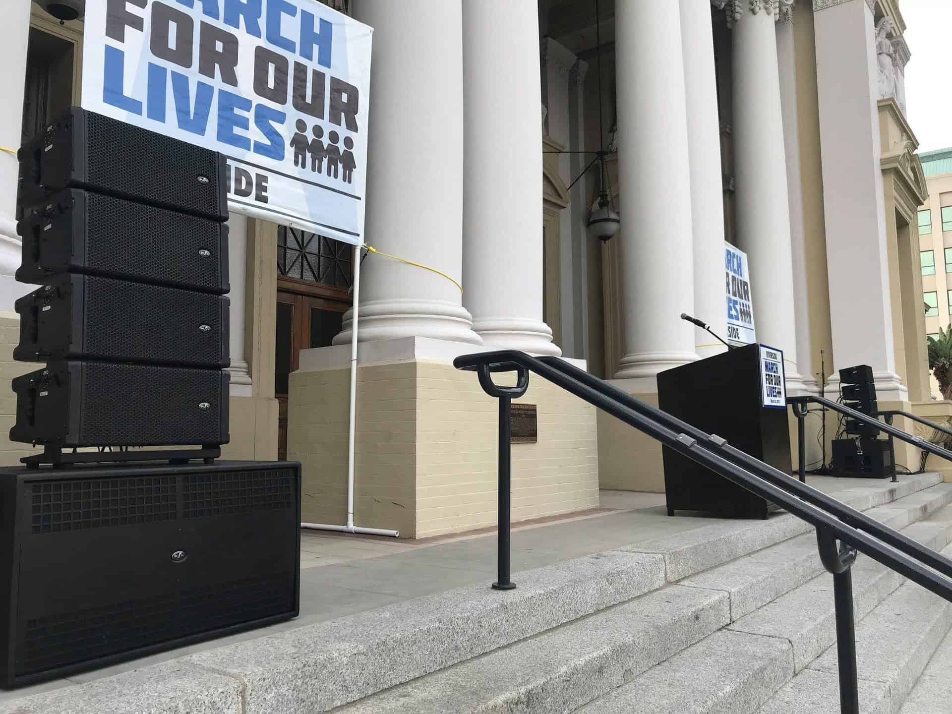 Speakers on steps of city hall