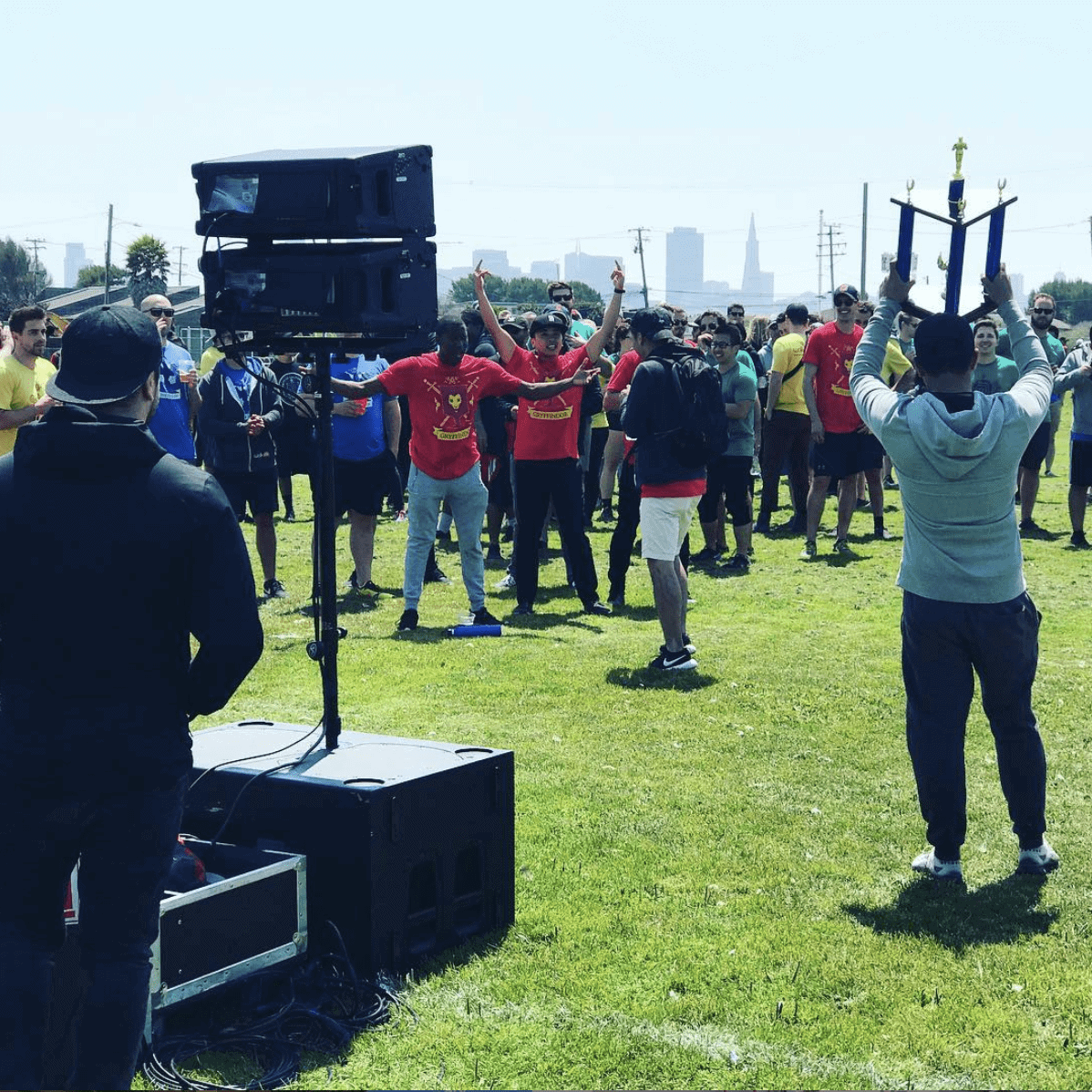 team building exercise outside with line array speakers