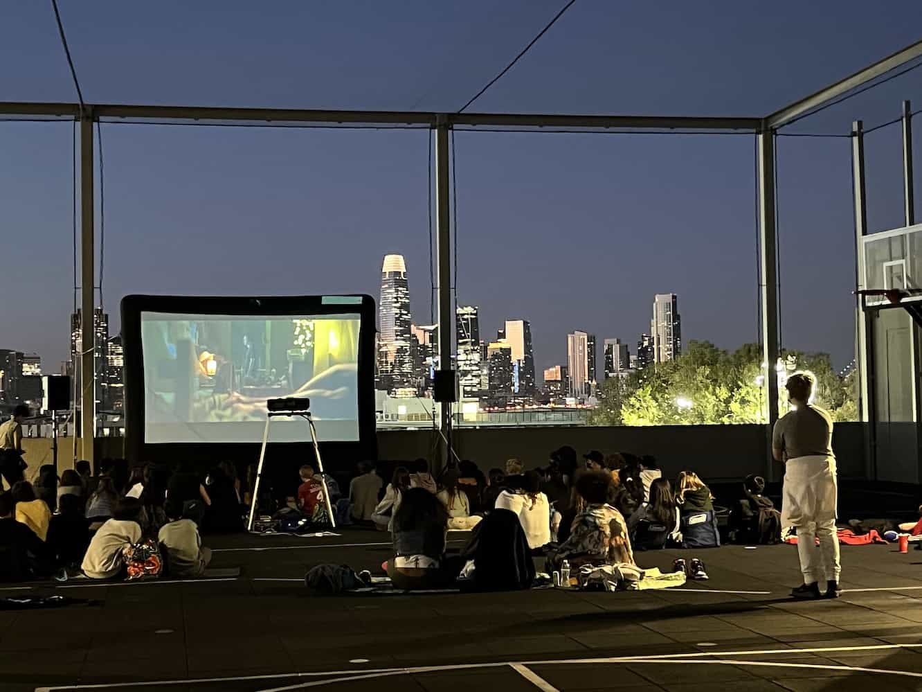 Rooftop outdoor movie with view of San Francisco