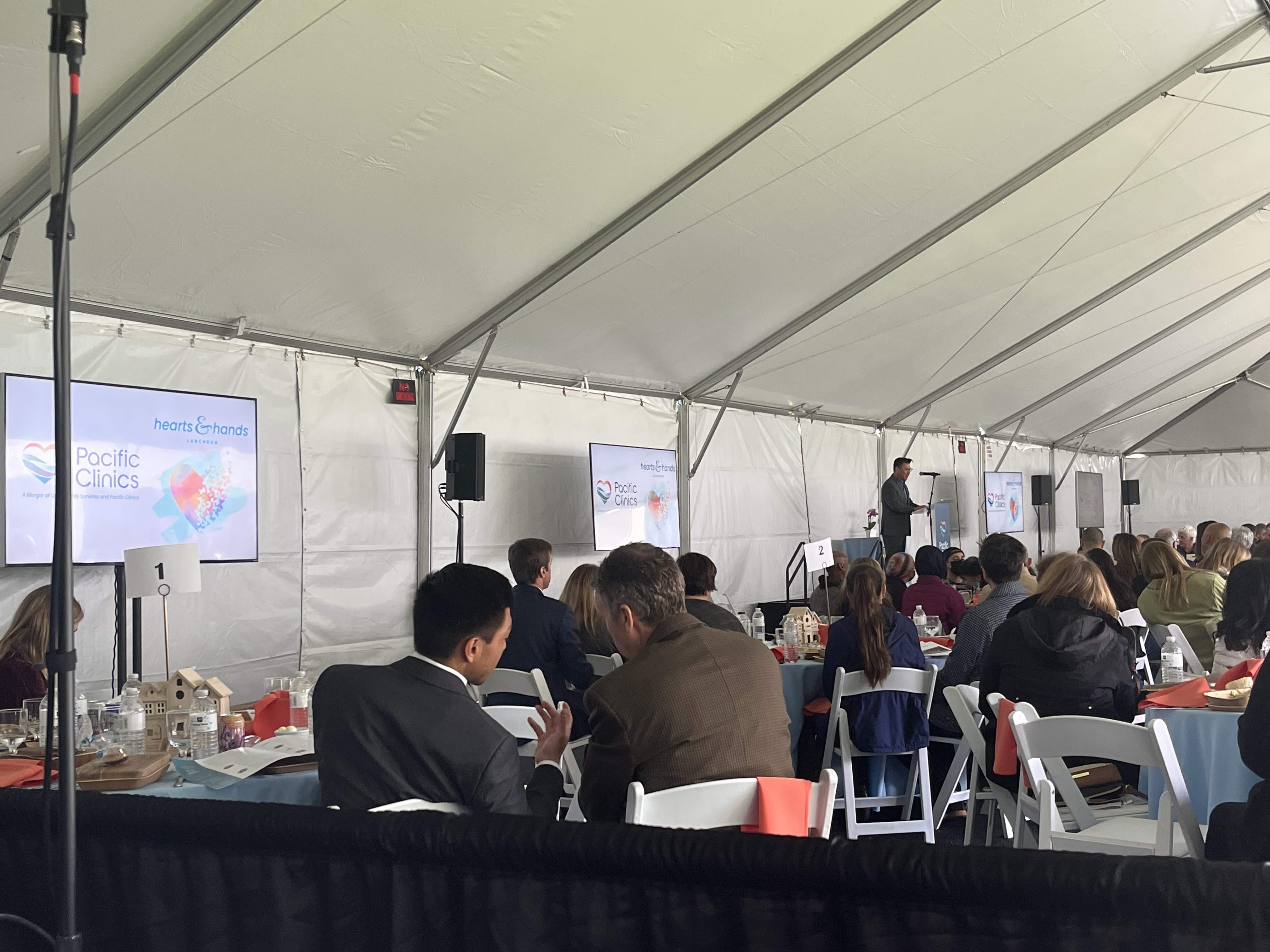 TV displays under tent for fundraising event