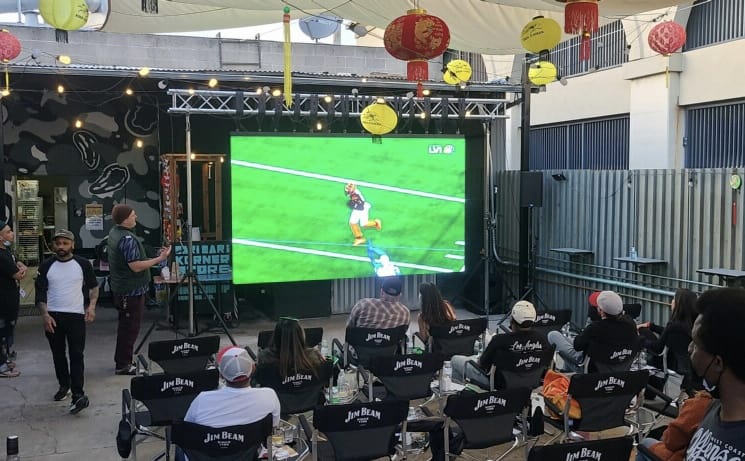 Video wall displaying Super Bowl in Oakland
