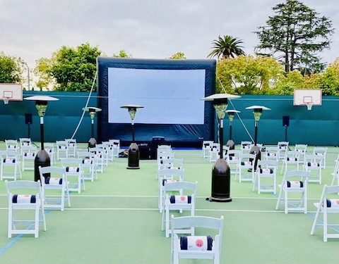 Large outdoor movie screen setup in San jose