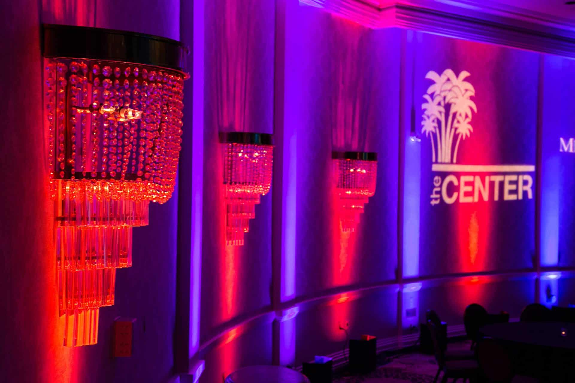 uplights on wall of hotel ballroom