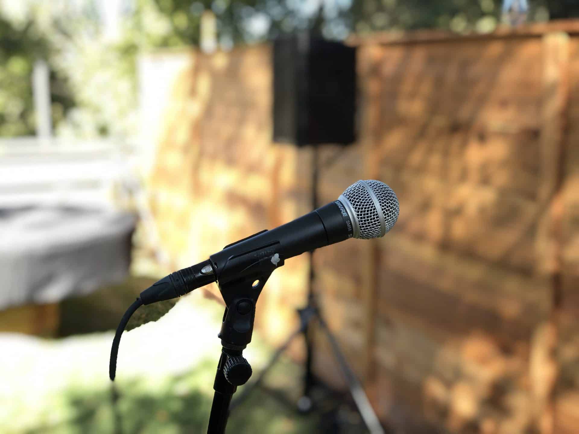 MIcrophone and speaker in front yard of home