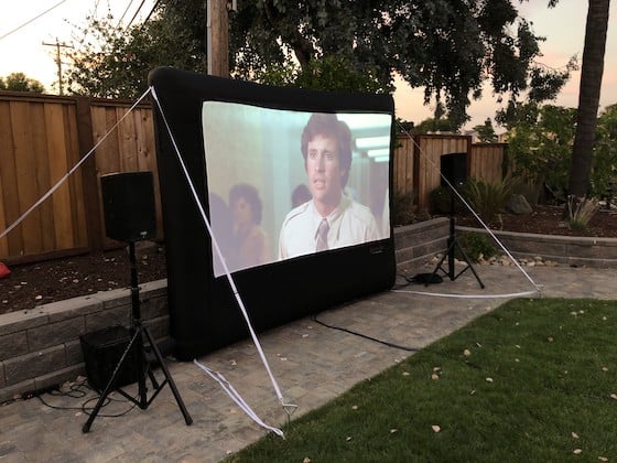 small inflatable movie screen in backard